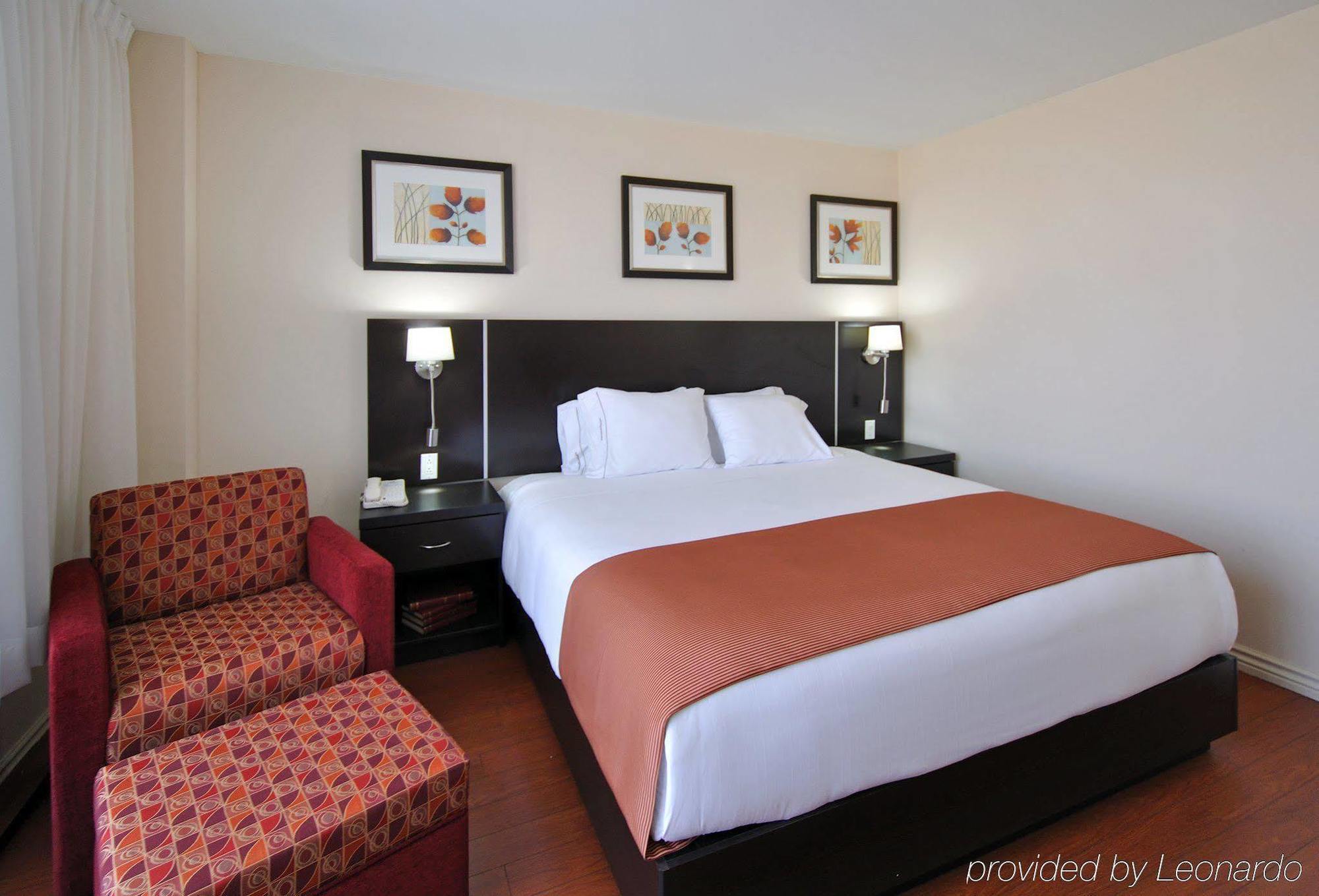 Holiday Inn&Suites Montreal Airport Dorval Habitación foto